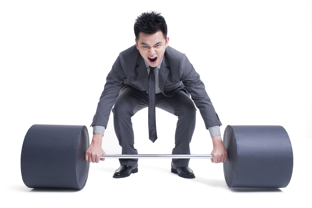 businessman-lifting-barbell (anxiety into strength)